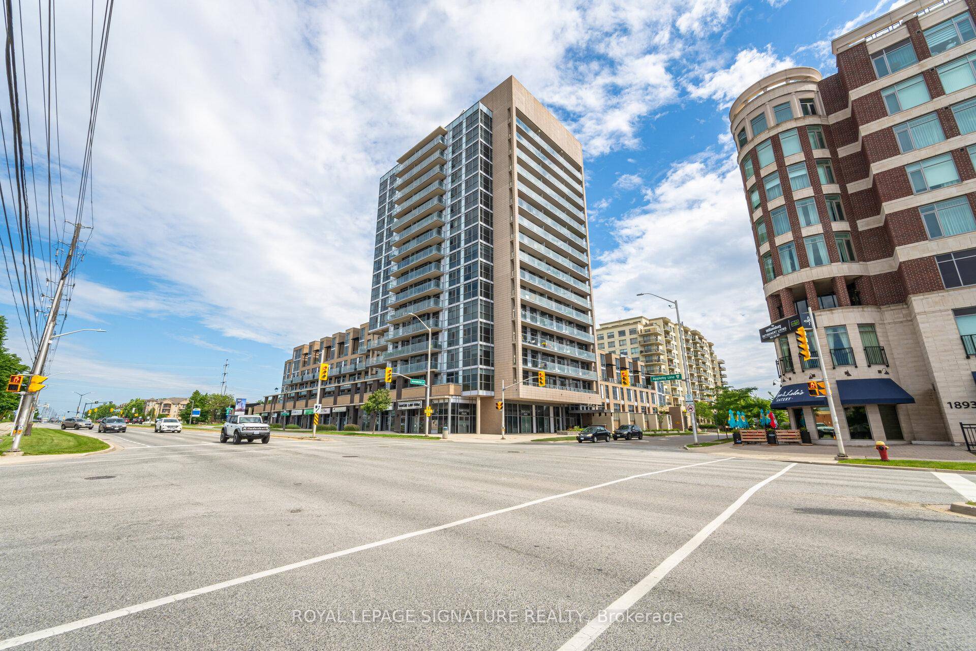 Stunning and unique 2 storey loft fully updated from top to bottom, featuring a stylish kitchen with granite counters, backsplash, stainless steel appliances, and a waterfall island perfect for entertaining.