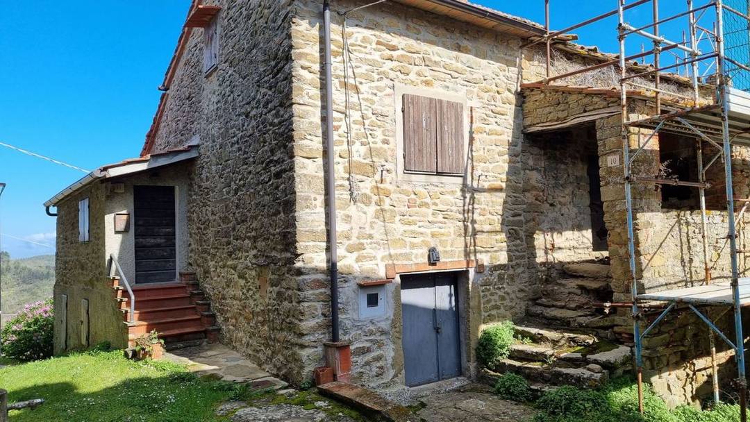 Unfinished portion of hamlet for sale in the countryside of Arezzo, Tuscany.