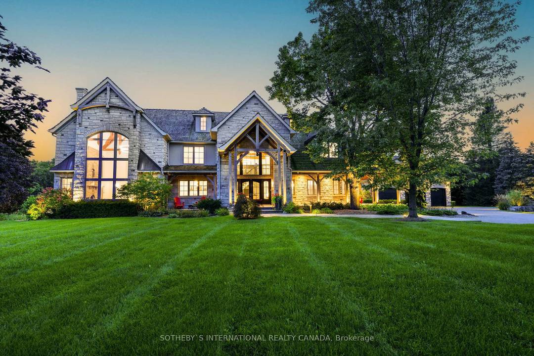 Nestled in the picturesque countryside of Kilbrides exclusive community, this magnificent estate effortlessly combines rustic charm and modern luxury.