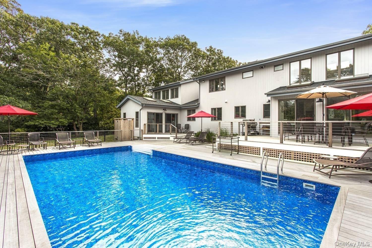 This sleek and stylish Old Harbor Colony contemporary has been totally redesigned and beautifully finished.