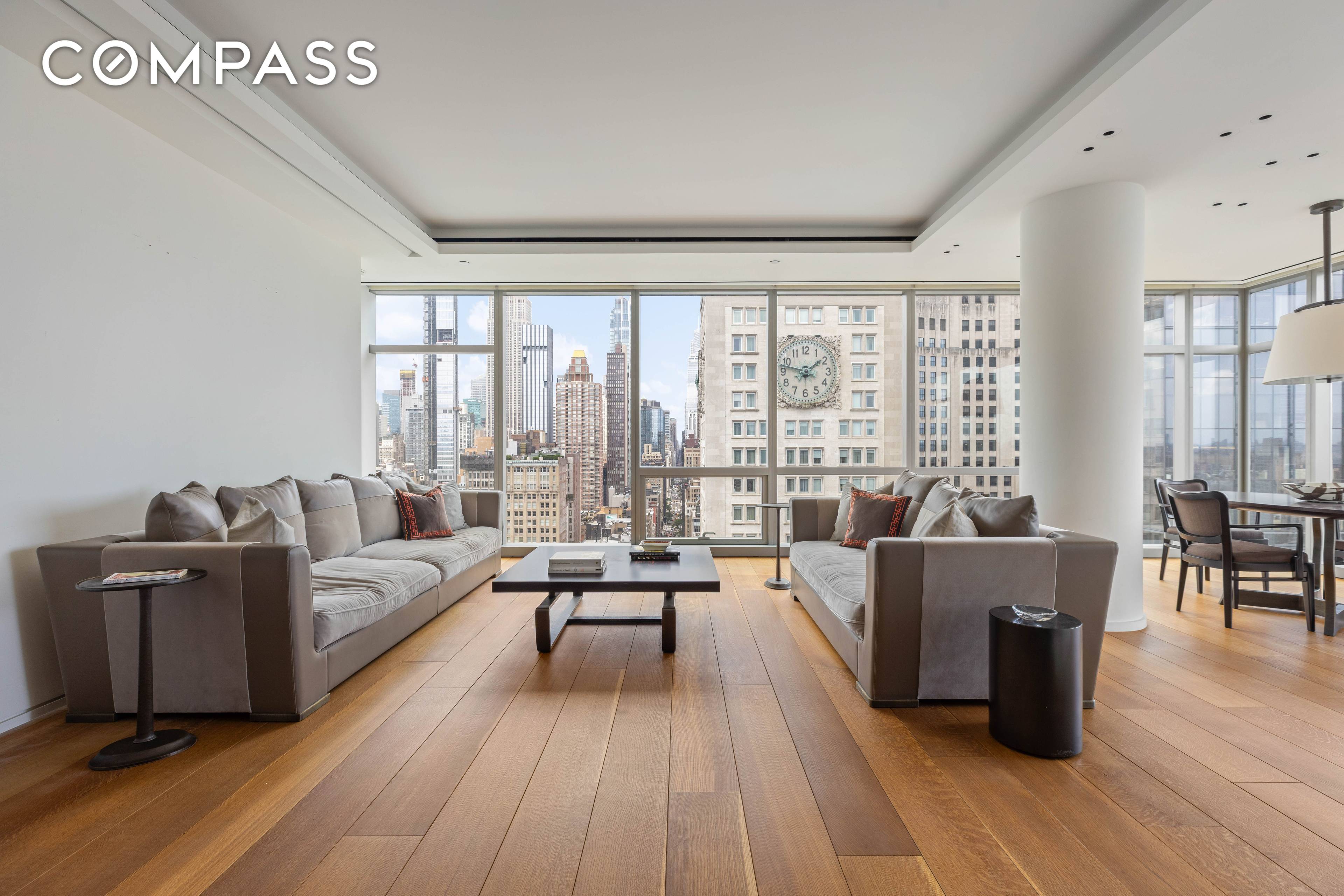 High above Madison Square Park, Residence 32B at One Madison captures panoramic views in every direction through dramatic floor to ceiling windows.
