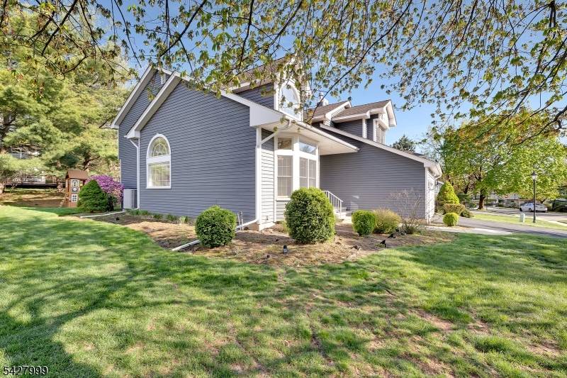 Pristine and filled with natural light, this expansive D model in desirable Autumn Ridge offers an impressive layout with soaring vaulted ceilings and an open, airy feel throughout.