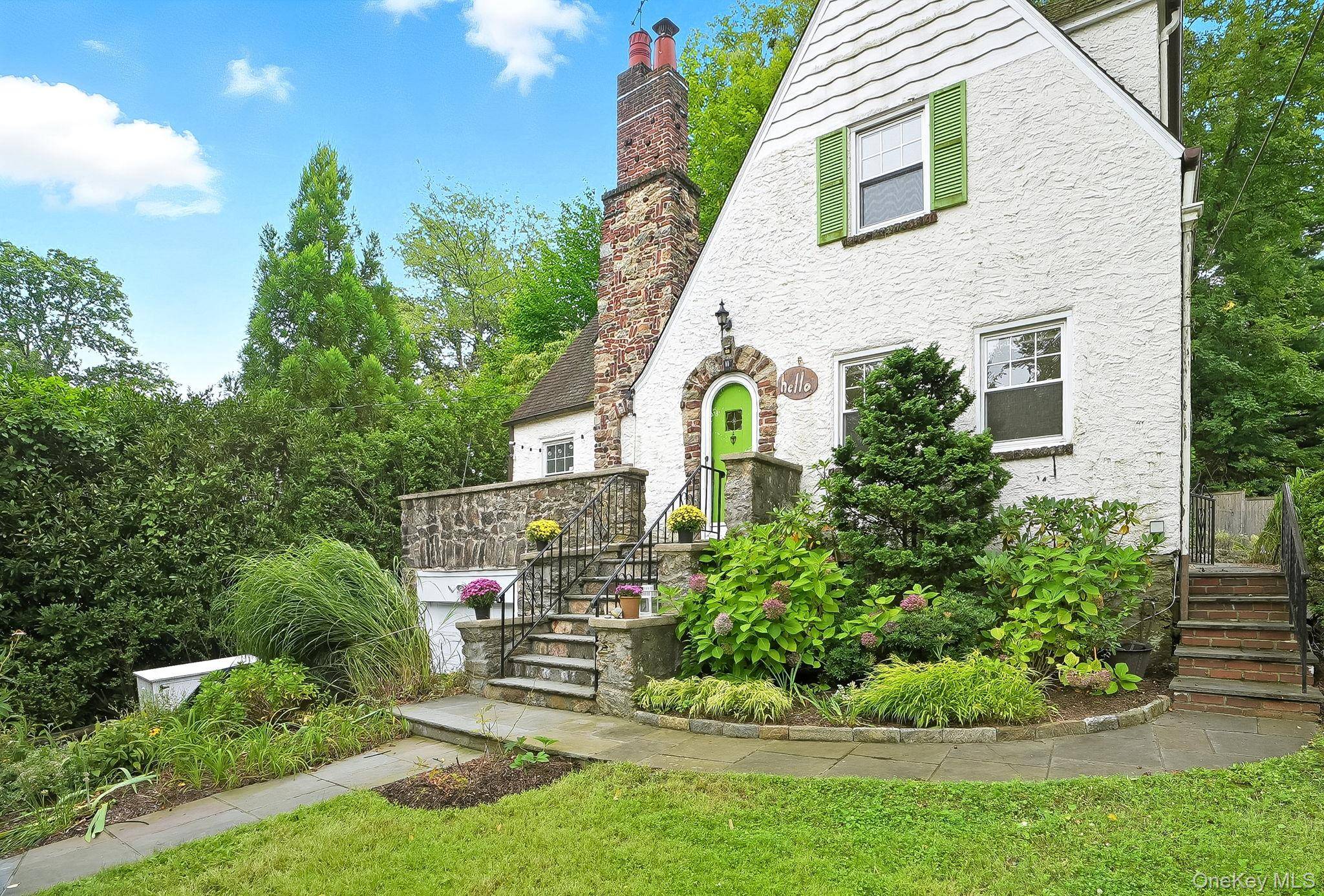 A MUST SEE charming storybook Village Tudor in prime location with close proximity to train, school, park, and town.