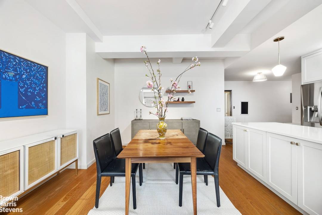 Apartment 4G is a substantial prewar two bedroom home spanning 1, 335 square feet with ceiling heights approaching 10 feet.