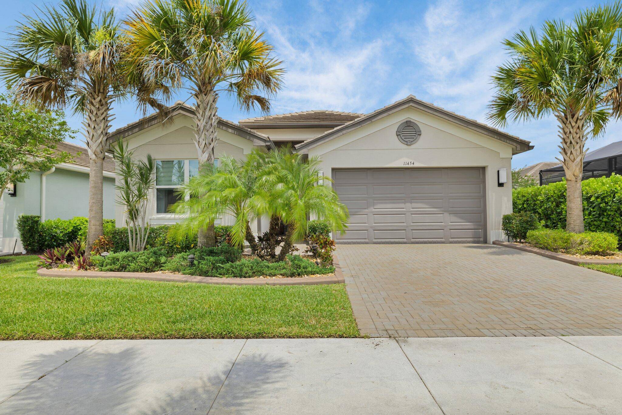 FOR SALE Heron Model, 2 bedrooms, 2 bathrooms plus an office flexroom, with Long Water View in Valencia Cay at Riverland.