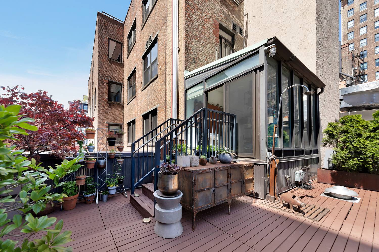 A rare true Flatiron LOFT with a PRIVATE terraced outdoor oasis complete with your own OUTDOOR SHOWER await.