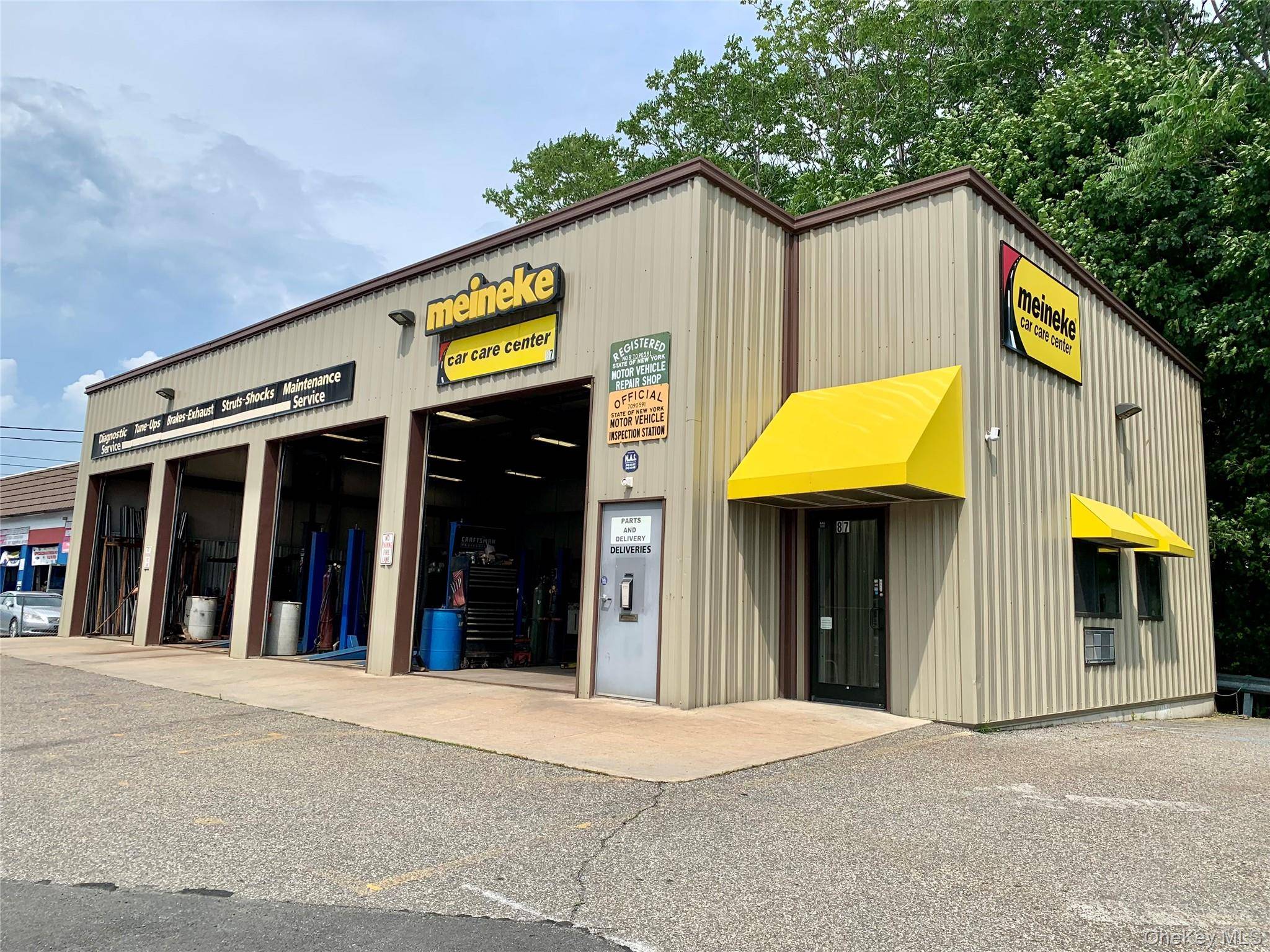 Fully Operational Meineke Auto Repair building.