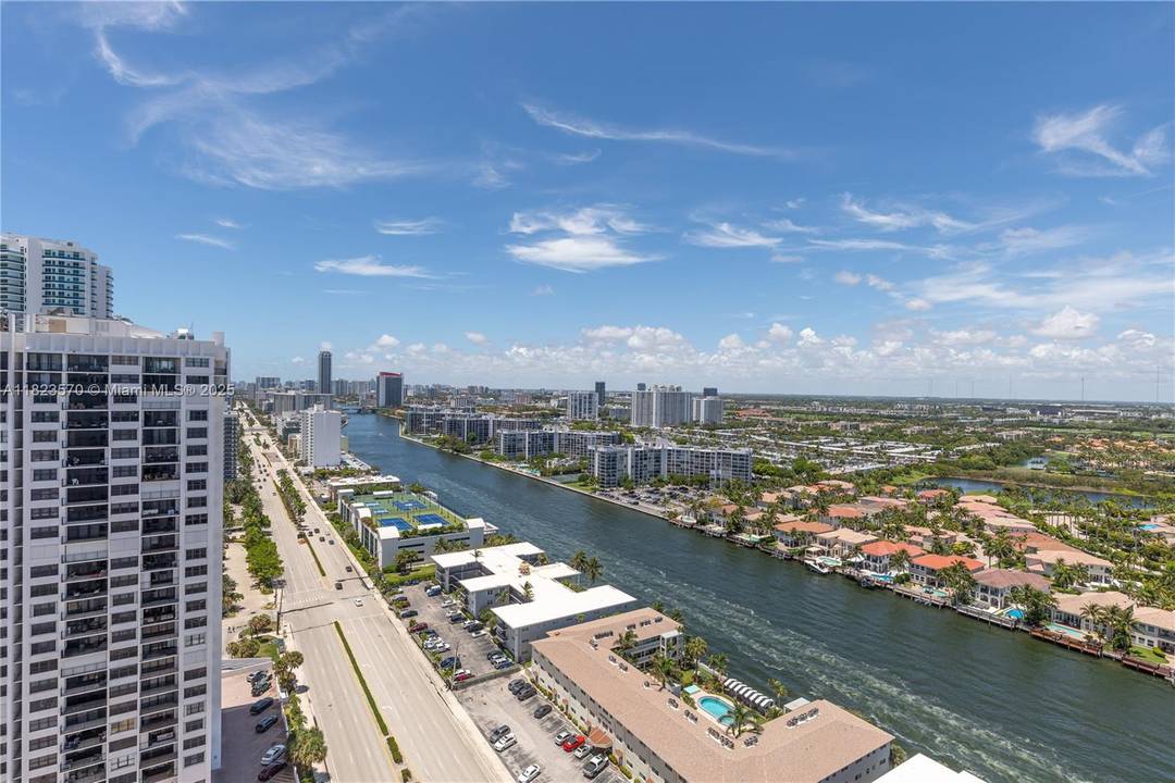 Step into this one of a kind lower penthouse and experience panoramic beauty from every angle.