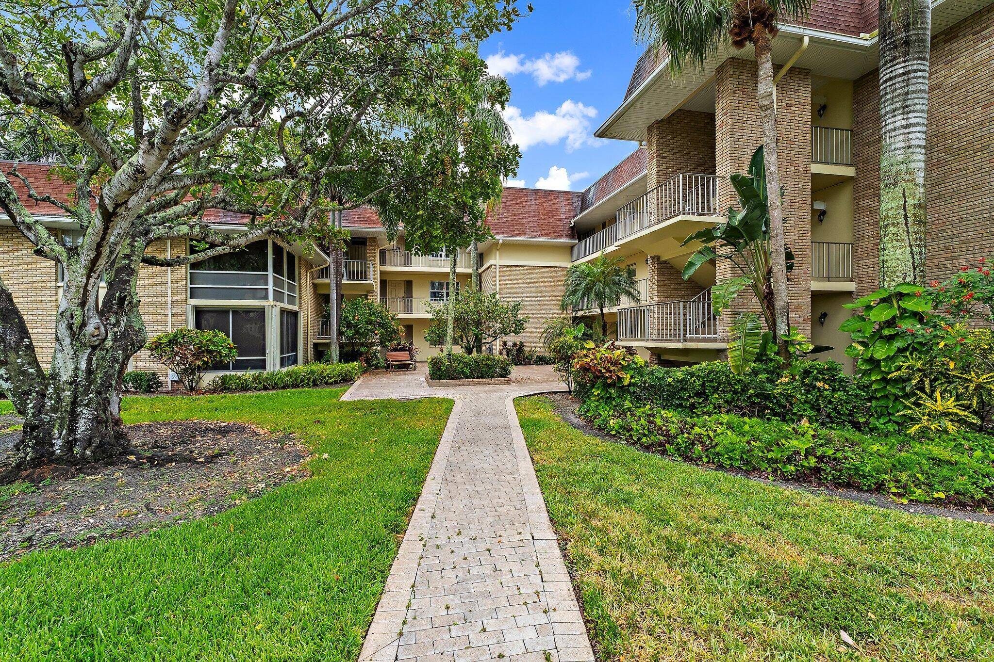 Desirable first floor two bedroom condominium with a freshly painted interior, enclosed porch, accordion hurricane protection and a dedicated carport is move in ready for a new owner.