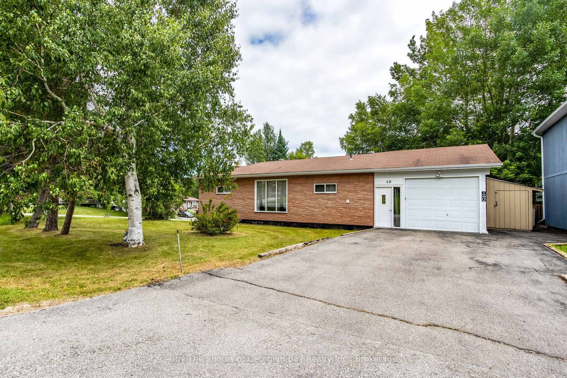 4 Season Home with Walk Out Basement on a Quiet Street Minutes to Town amp ; Marinas.