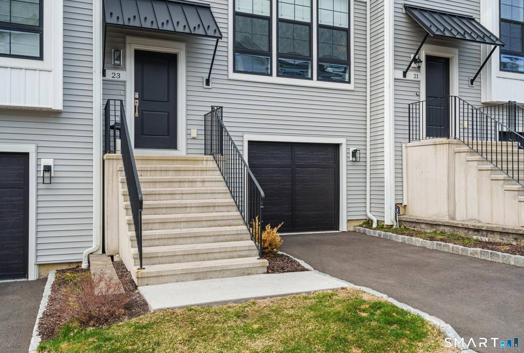Welcome to 23 East Cross, a meticulously maintained townhome where thoughtful design meets modern living.