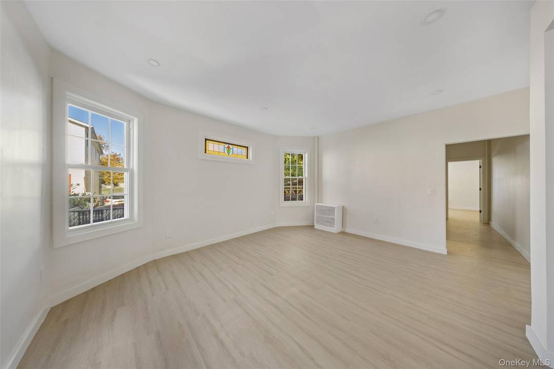 Beautifully Renovated 3 Family Home !