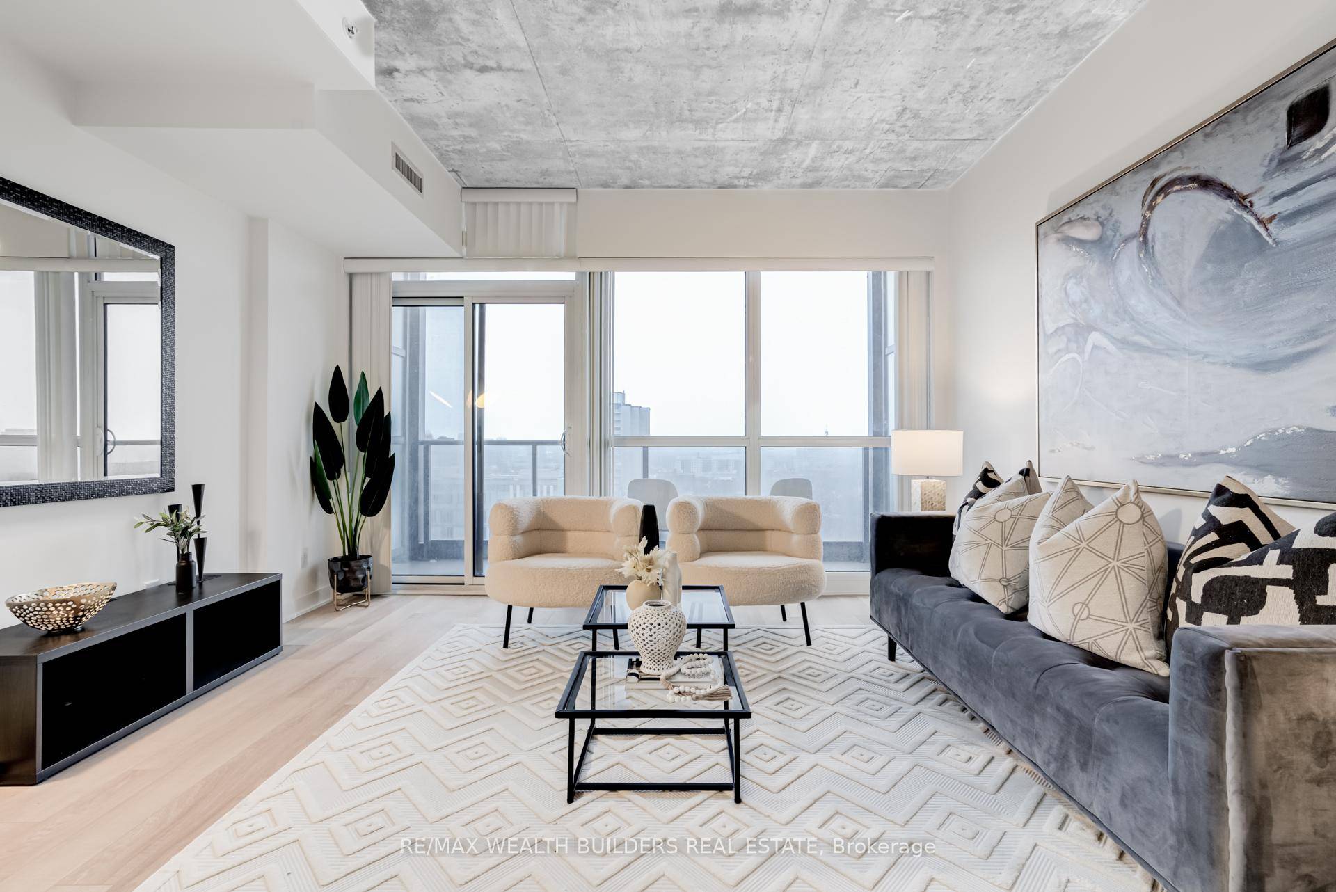 Large 677 sq. ft. 1 plus den plus a 68 sq.