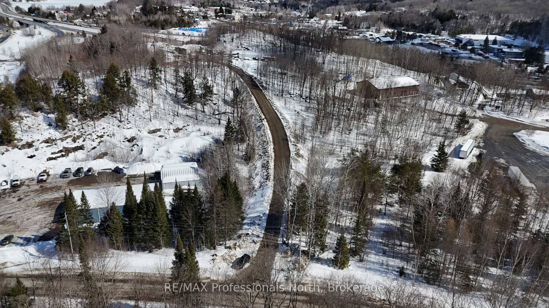 Unlock the potential of this 10 acre industrial parcel, ideally situated at the south entrance to Huntsville with high visibility frontage on Highway 11.