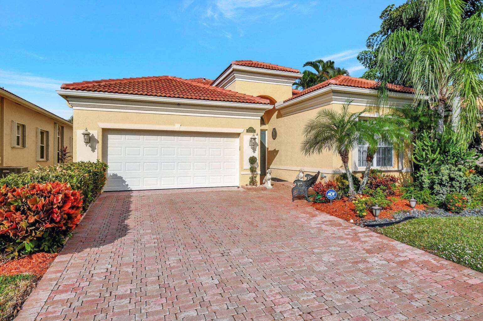Absolutely stunning Lakefront home on one of the street in beautiful Vizcaya in Delray Beach.