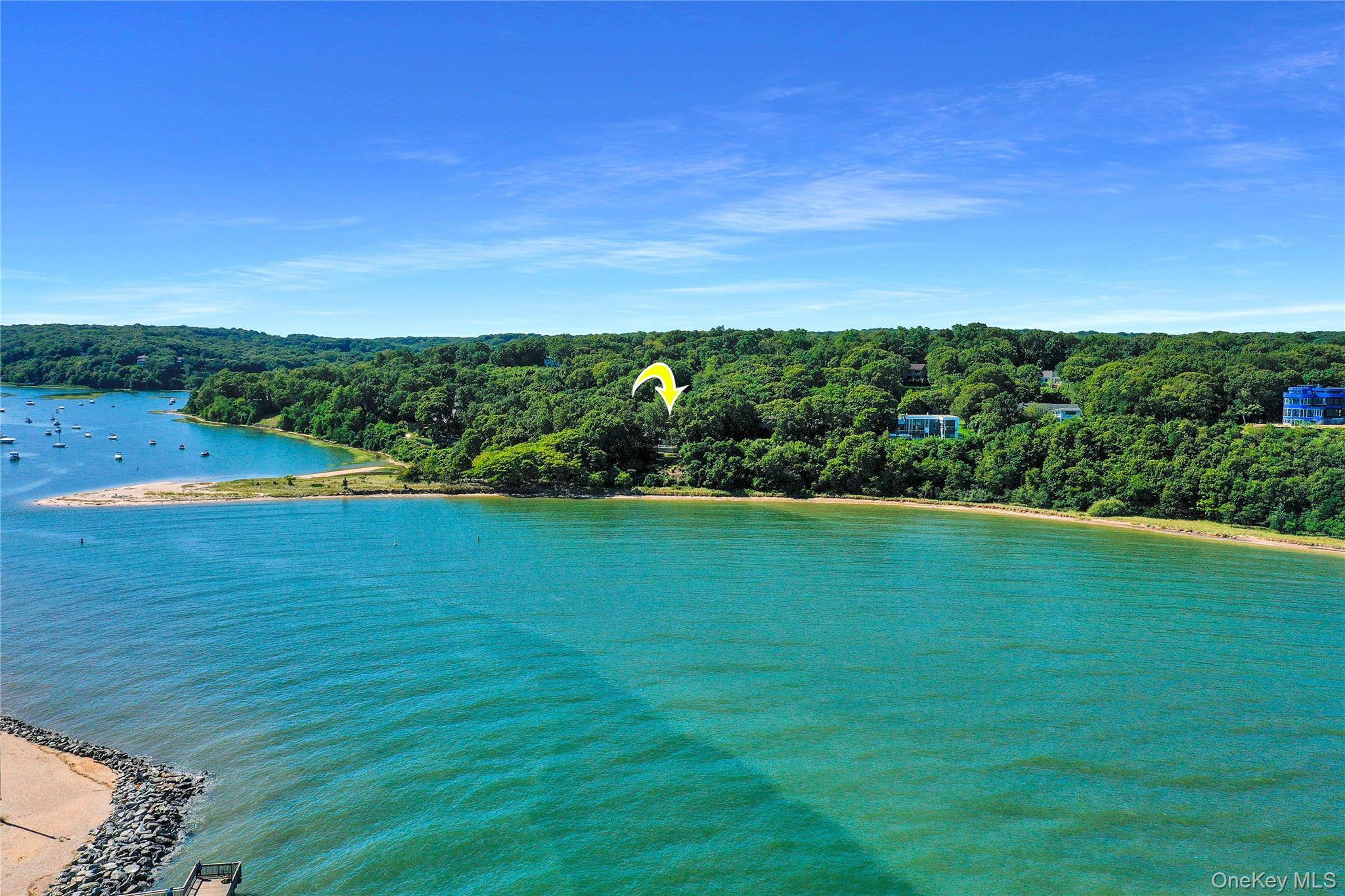 This breathtaking beachfront property in one of Port Jefferson's most prestigious locations is available for the first time in over 50 years !