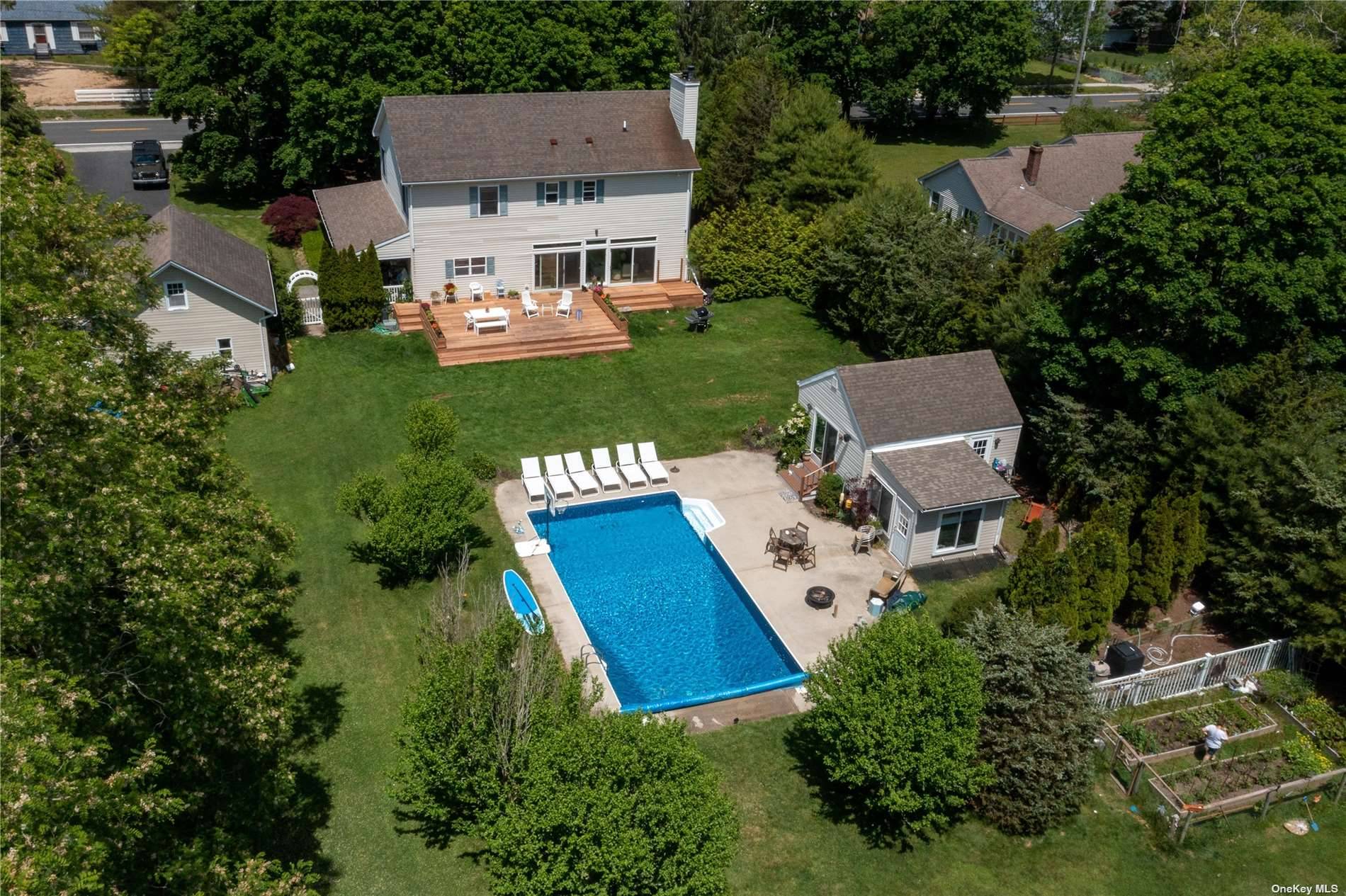 Immaculate Traditional Home Situated On A Very Private Landscaped Acre In The Quaint Hamlet Of Remsenburg.