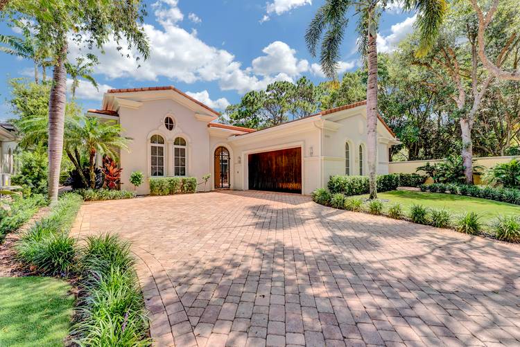 Welcome to this stunning single story residence in Old Palm Golf Club, offering 3, 820 square feet of thoughtfully designed amp ; newly renovated living space.