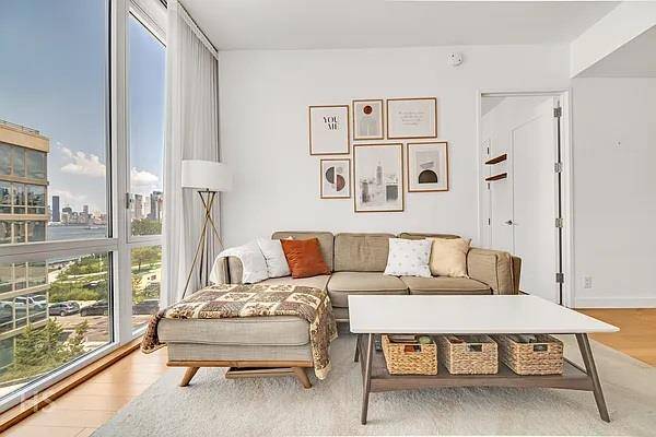 Gorgeous 1BD with East River and Manhattan Views available in the prestigious Edge condominium.
