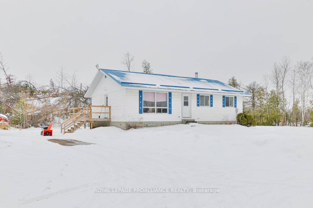 Enjoy the peace and privacy of country living with this charming 3 bedroom bungalow set on 11 acres of open space, gardens, and woods.