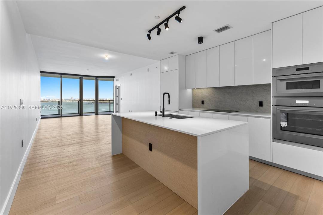 Residence 2905 at Aria Reserve South is a renovated, east facing 3 bedroom plus office with 3.