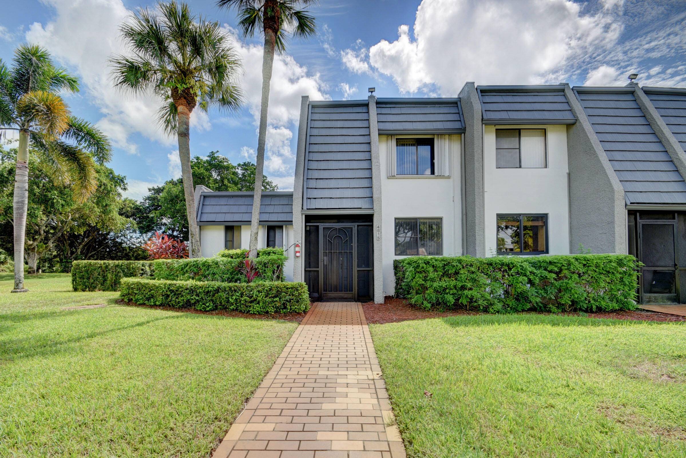 Beautifully maintained 3 bedroom, 3 bath corner unit on the golf course, with the master bedroom conveniently located on the first floor.