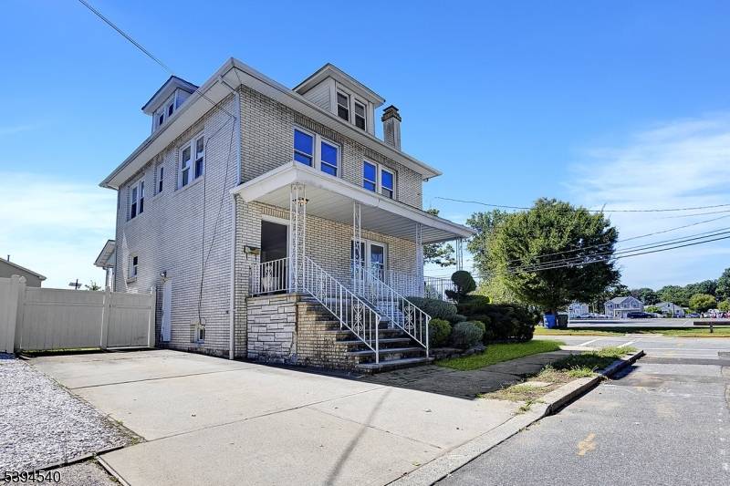 WOW ! ! ! Come see this Large BRICK Colonial located right in the Heart of Town.