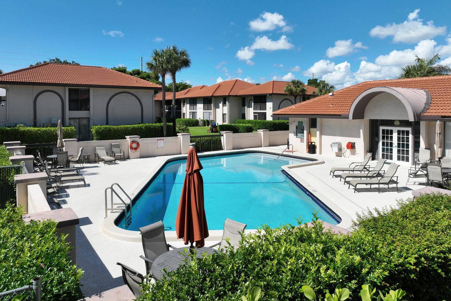 Chic Renovated Corner Retreat in East Boca's San Remo !