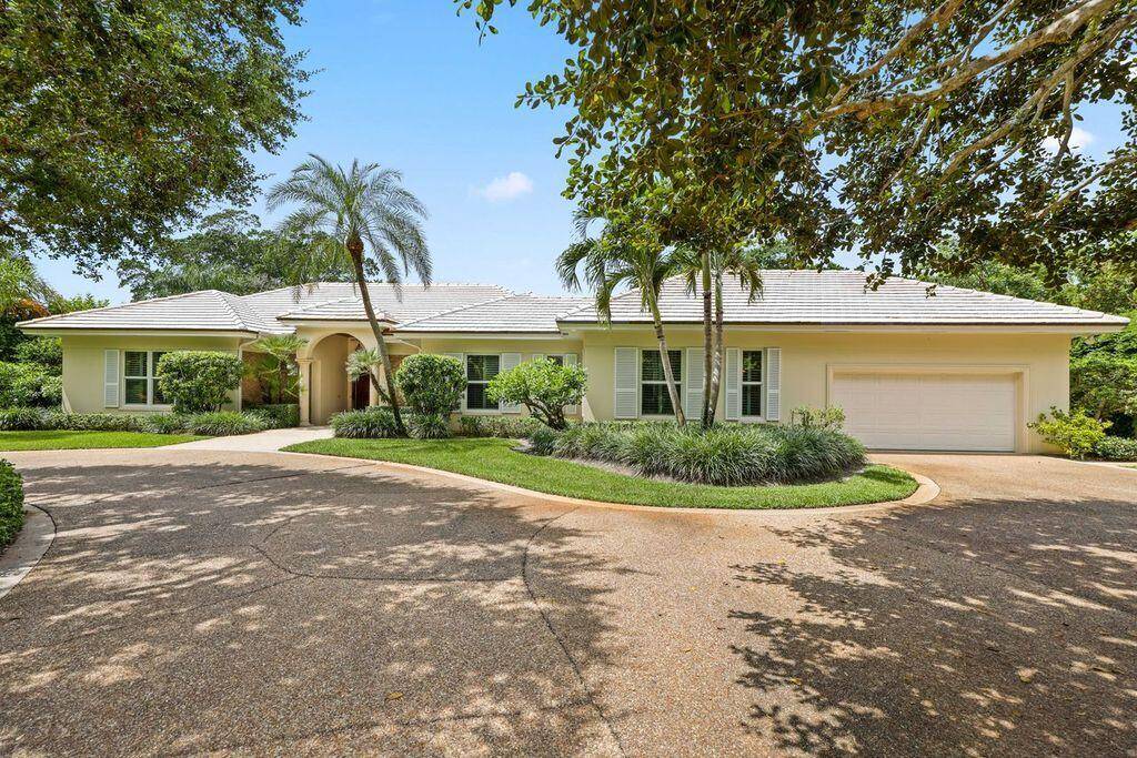 Elegantly situated in the prestigious Village of Golf, 5 Country Road East A is a gracious single family residence offering timeless style and serene golf course views.