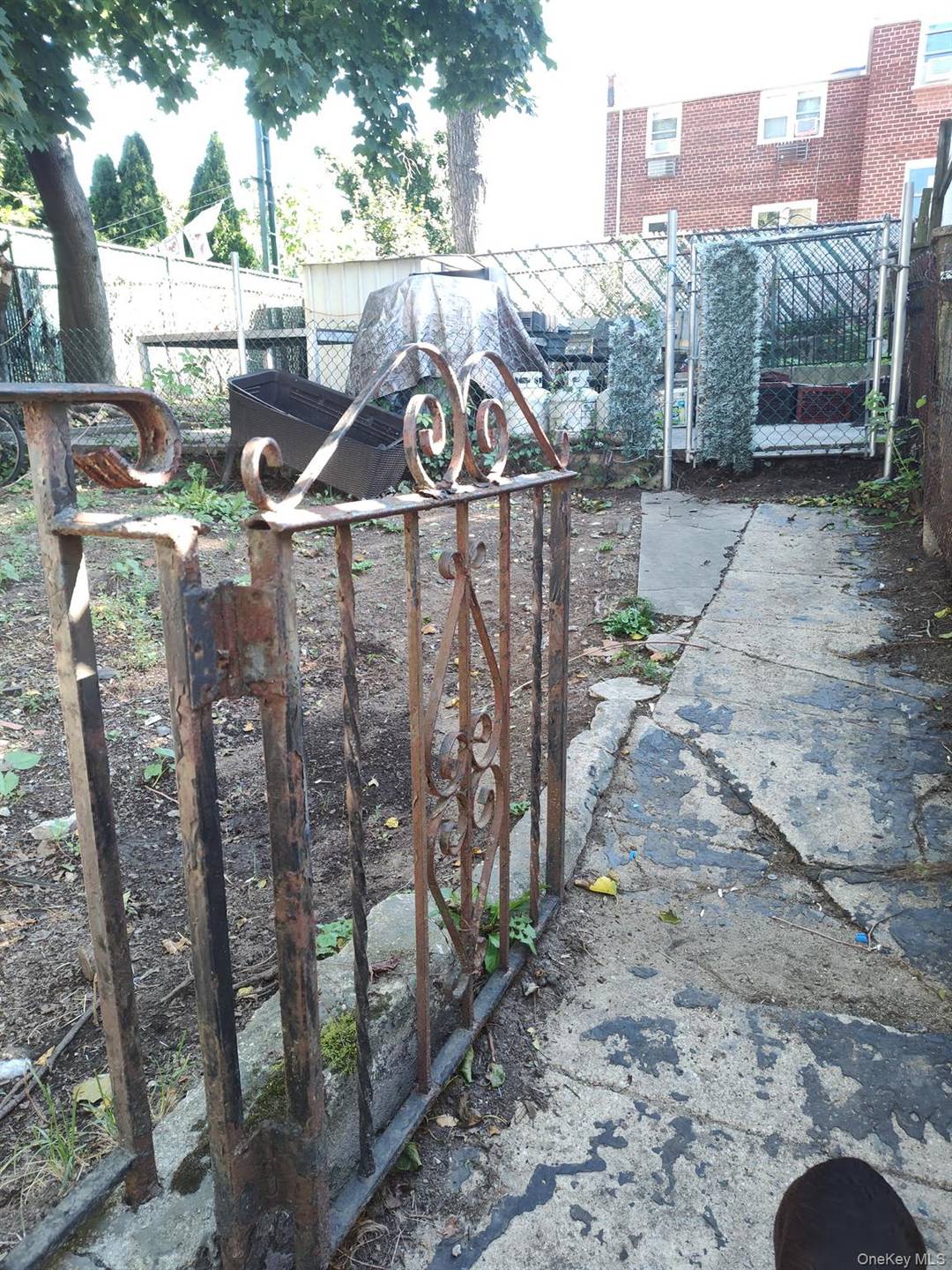 Small bungalow. Could be totally rehabbed or second floor could be added, or could convert it 2 Family with proper permits.