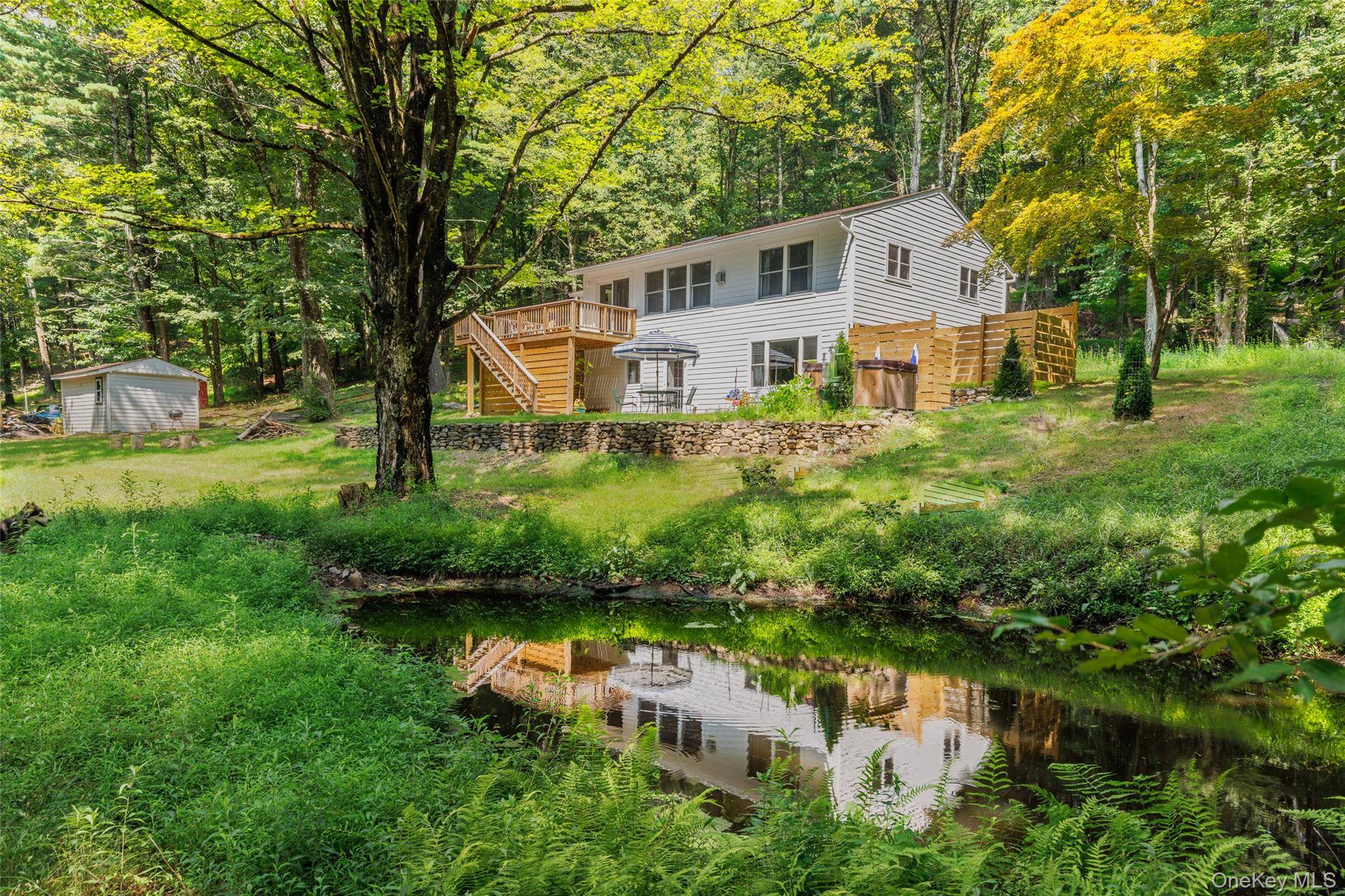 19 Bakertown Road is a brand new gut renovated, impeccably furnished two bedroom country home that sits high on a hill off a quiet country road in idyllic Accord, NY.