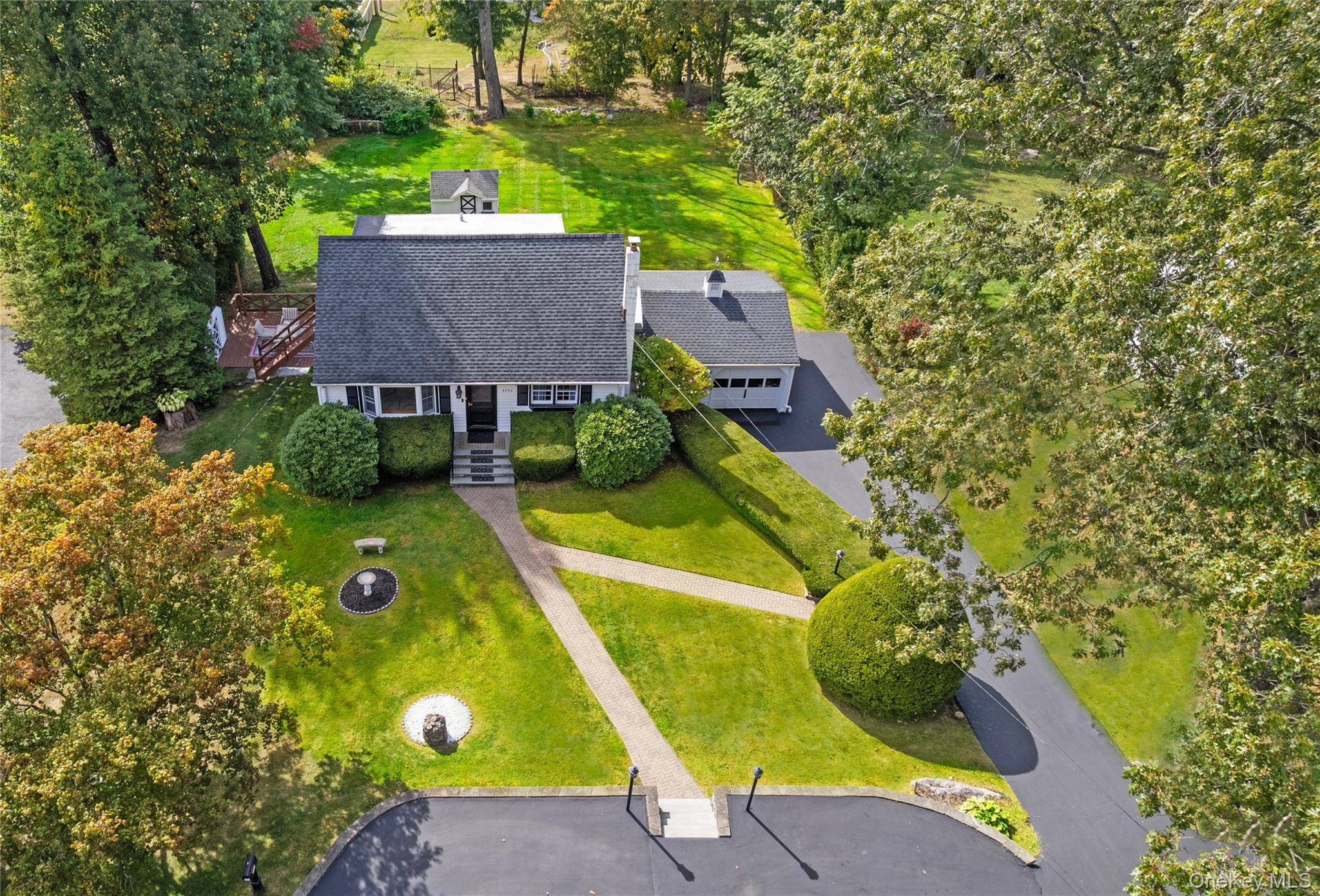 Timeless charm and thoughtful versatility define this inviting Cape Cod style 4 bedroom, 3 bath home, ideal for multi generational or extended family living.