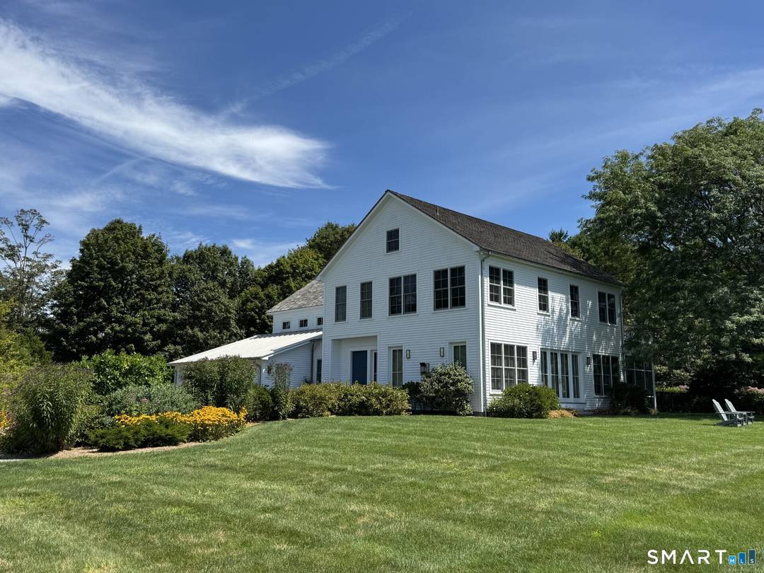 Step into luxury in this immaculate home on Washington's most prestigious streets overlooking farmland and large protected fields.