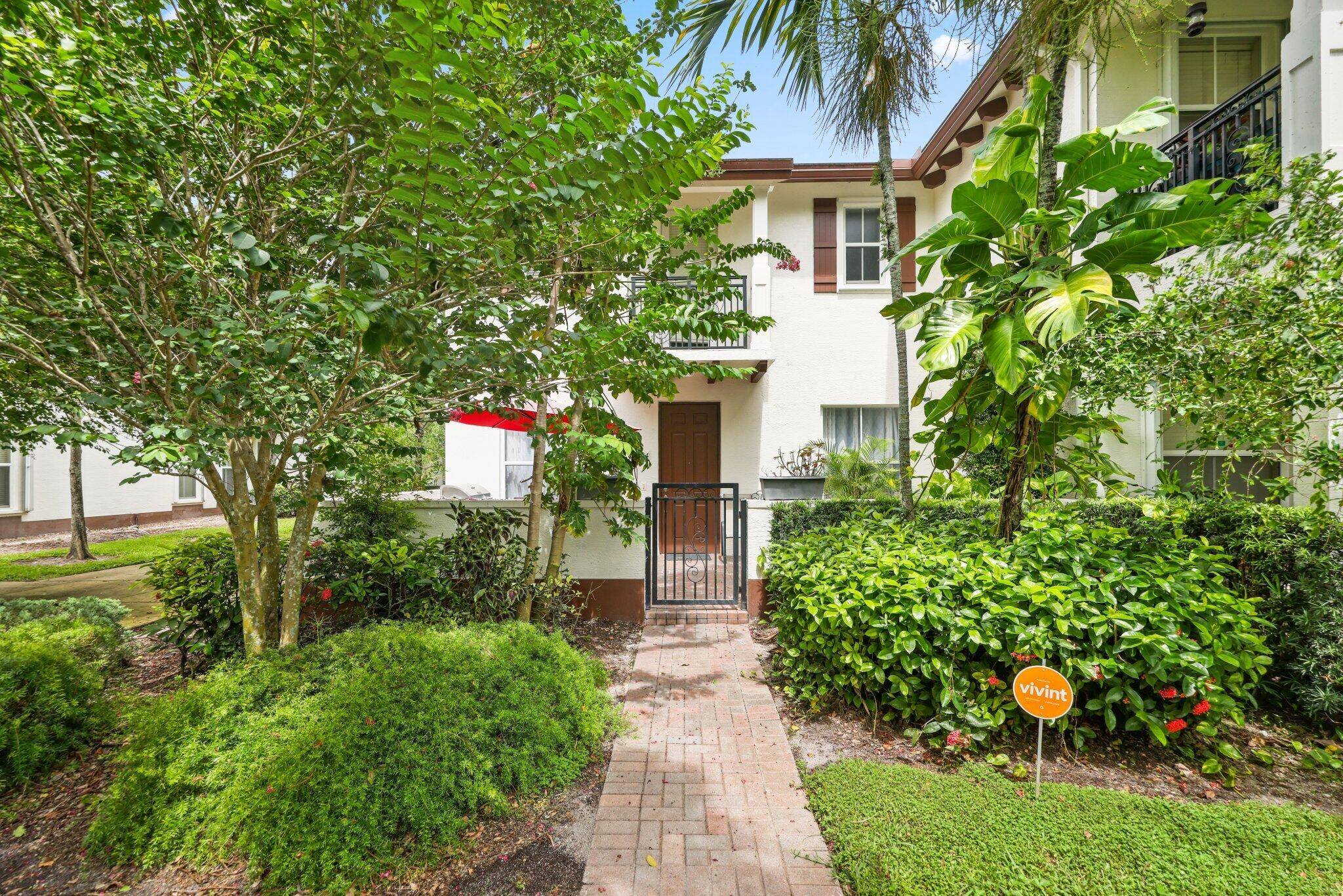 Totally remodeled 4 bedroom, 3 bath corner unit townhome in the highly sought after gated community of Paloma Lakes !