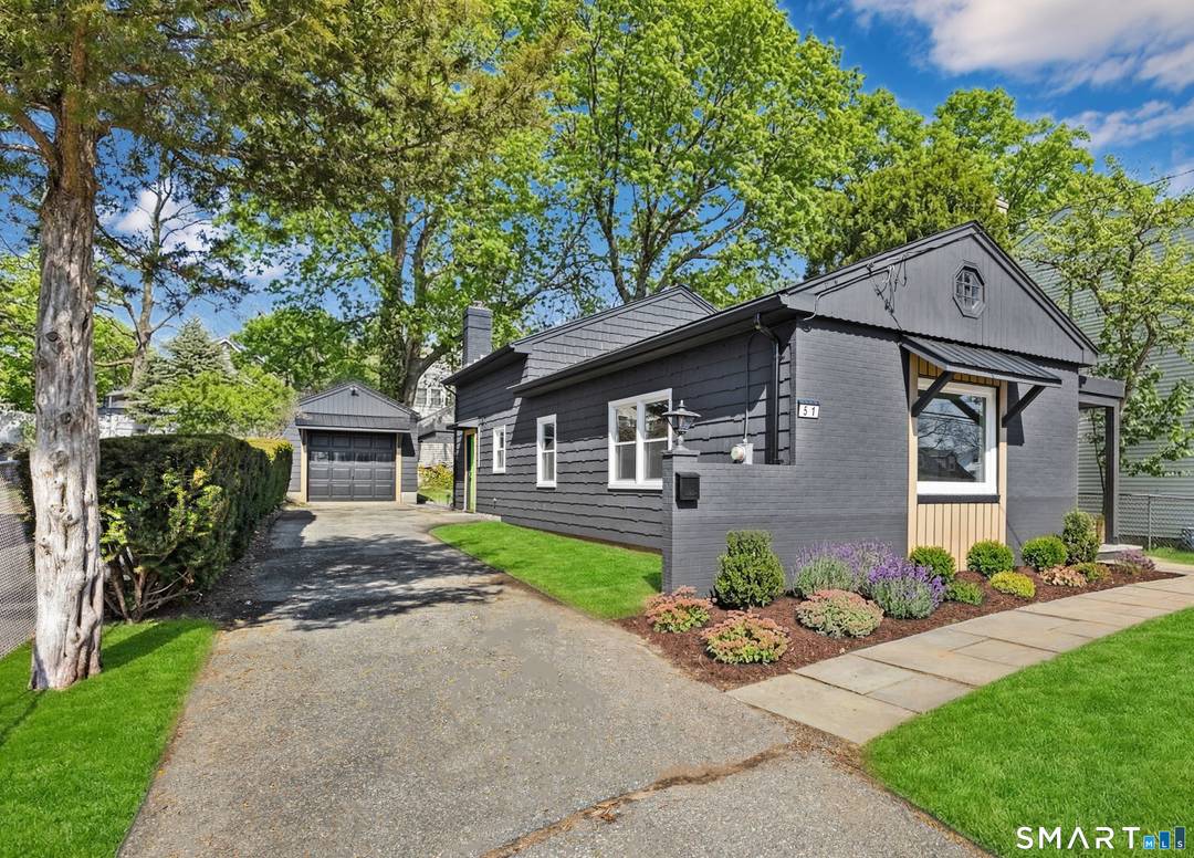 Special designer home in heart of the village of Springdale, perfectly renovated for today's everyday living and entertaining !