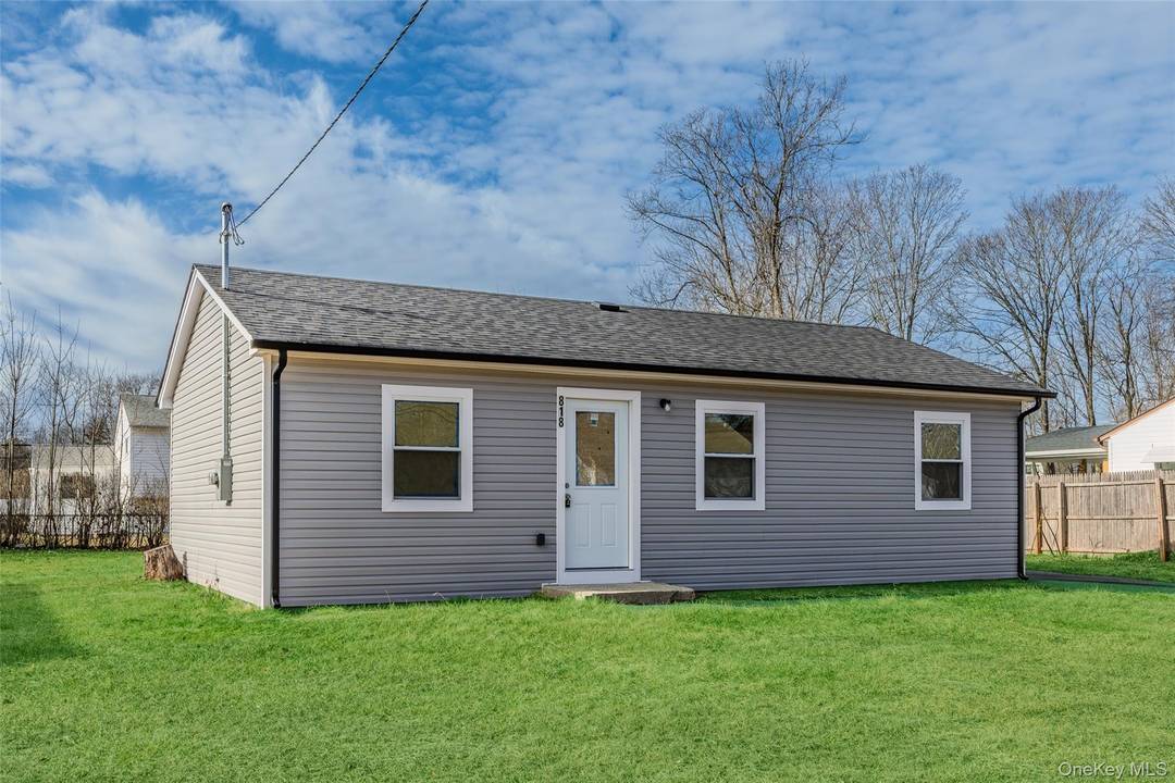 Great curb appeal is an added value to this totally renovated and maintenance free 3 bedroom Ranch with LOW TAXES !