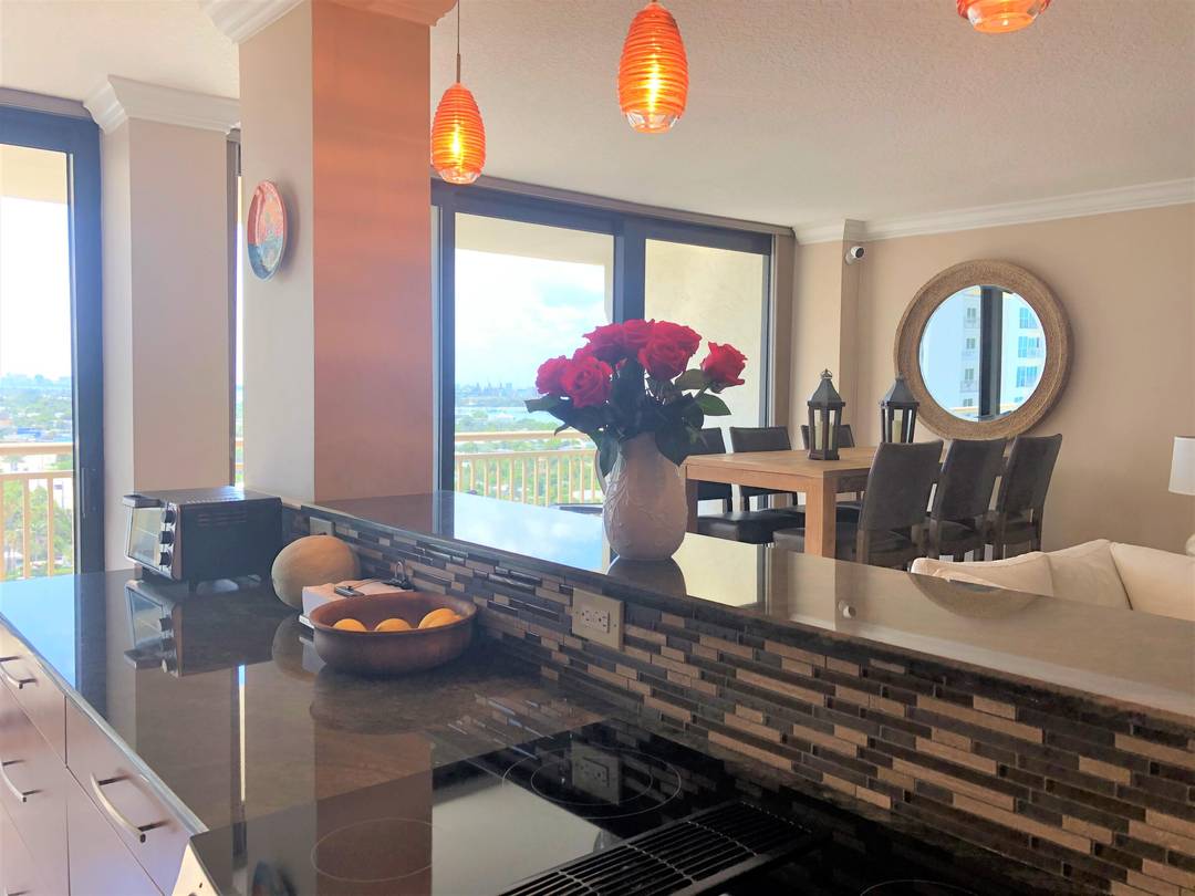 This large condo on the 15th floor in desirable Oceantree on Singer Island has been completely remodeled throughout and has beautiful views of both the ocean and the Intracoastal.