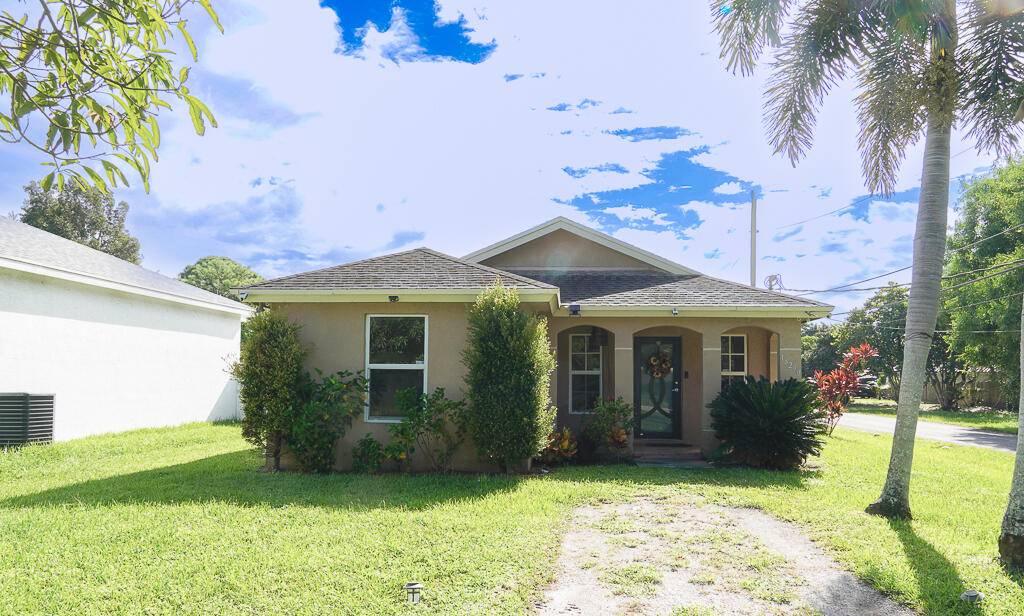 Welcome to 18290 Limestone Creek Road, nestled in the heart of Jupiter.