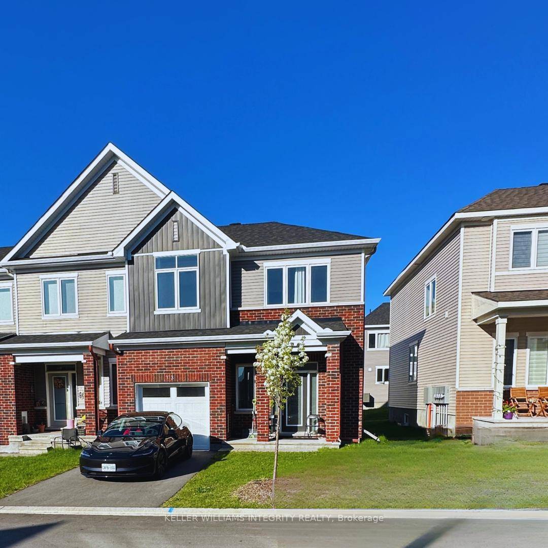 Welcome to 313 Canadensis Lane, a beautifully upgraded 2023 built end unit townhome in the desirable Half Moon Bay community of Barrhaven.