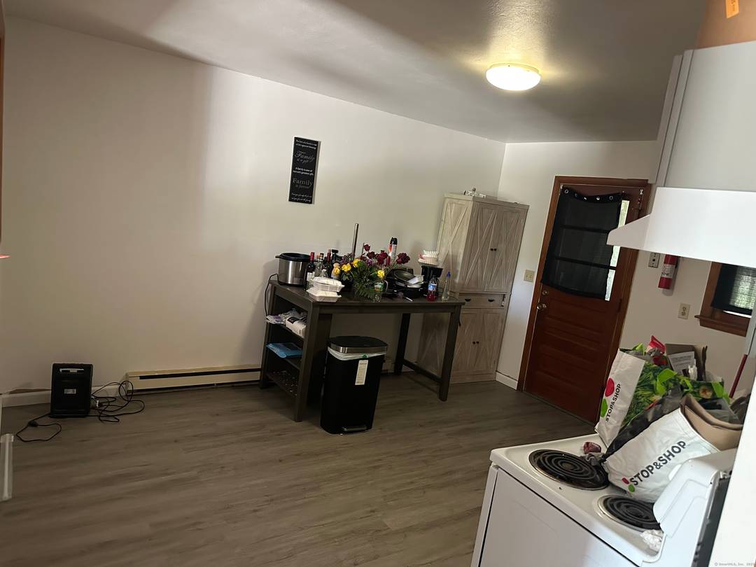 Three townhouses. Each unit features 2 bedrooms and 1 and a 1 2 bath.