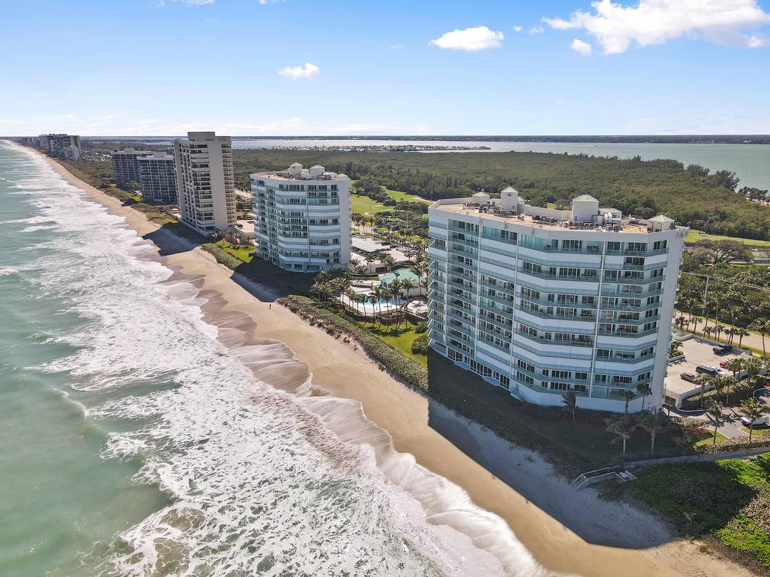 Live oceanfront and riverfront in this 3BR 3BA, 2, 263 sq ft ''through'' residence at Regency Island Dunes on South Hutchinson Island.