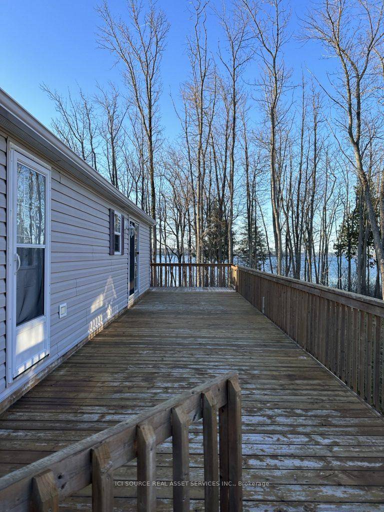 Situated on a beautiful lakefront site at Bellmere Winds Resort, this cottage has all you need for a summer cottage.
