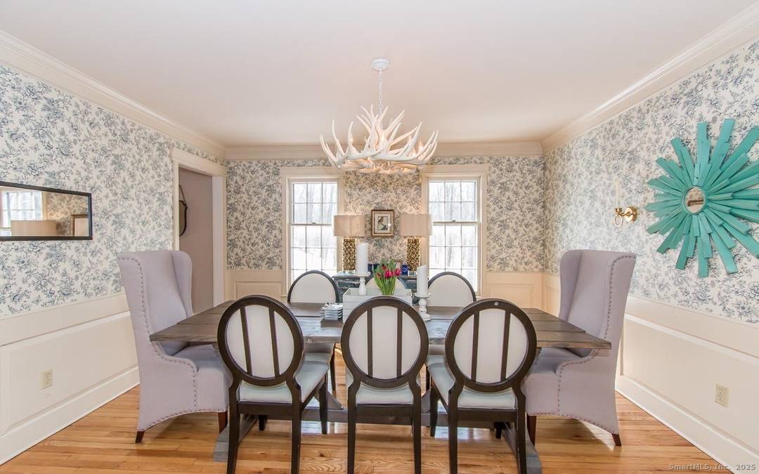 Feel right at home in this beautifully crafted Williamsburg reproduction colonial, offering timeless design paired with casual elegance throughout.