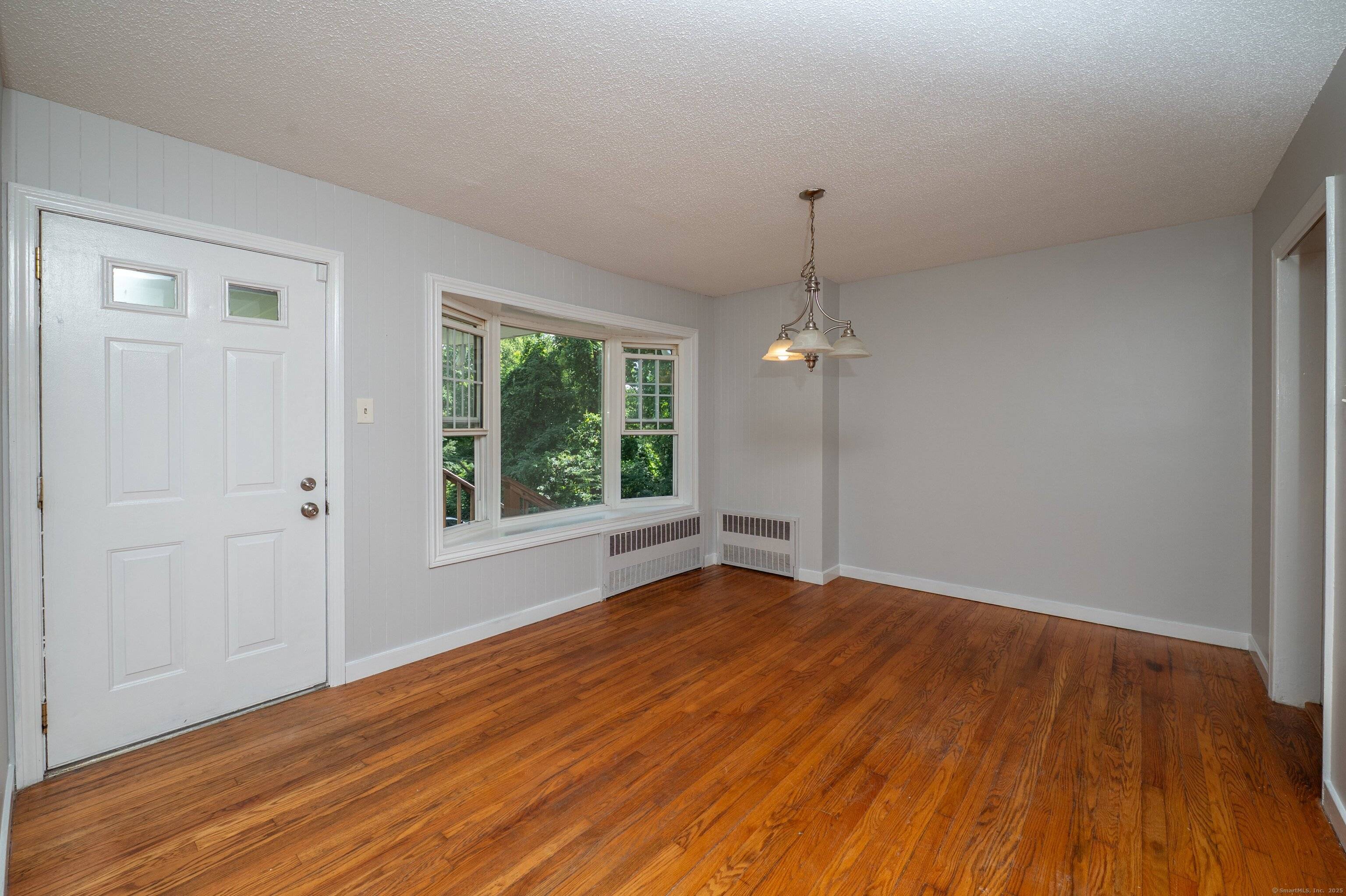 Set on an oversized, private lot along a back country road, this beautifully updated ranch offers the ease of single level living with the added bonus of a finished walk ...