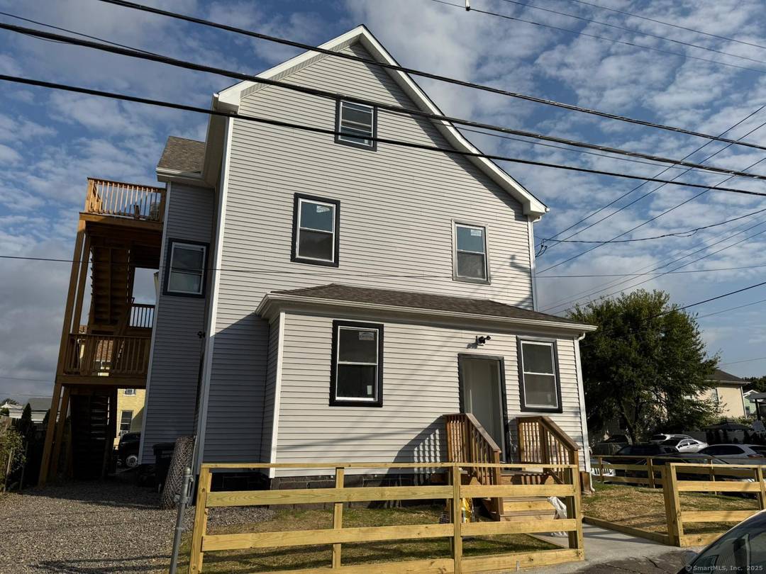 EVERYTHING NEW ! Stunning Legal 3 Family Home !