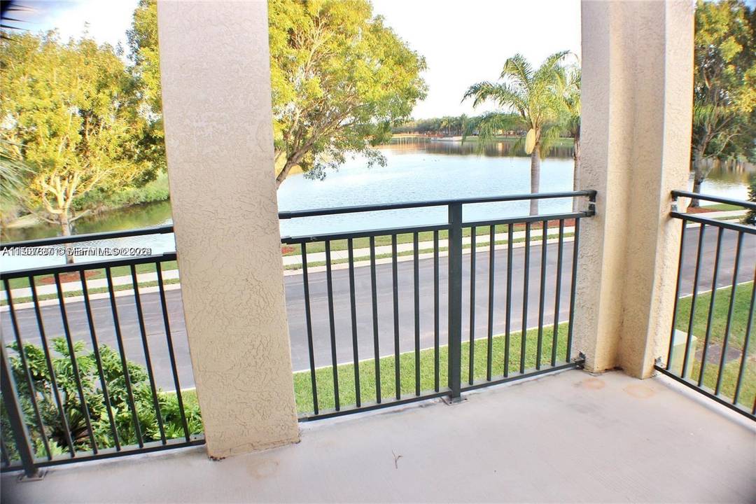 Beautiful 2 Bed 2 Bath Townhouse with a 1 Private Car Garage amp ; a Large Patio overlooking the Lake !