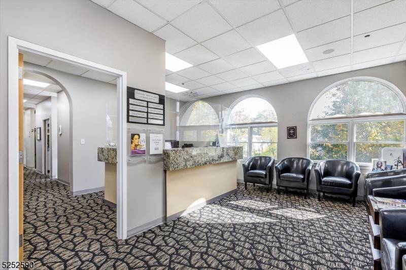 STEP INTO AN INCREDIBLE OPPORTUNITY WITH THIS AMAZING END UNIT OFFICE CONDO.