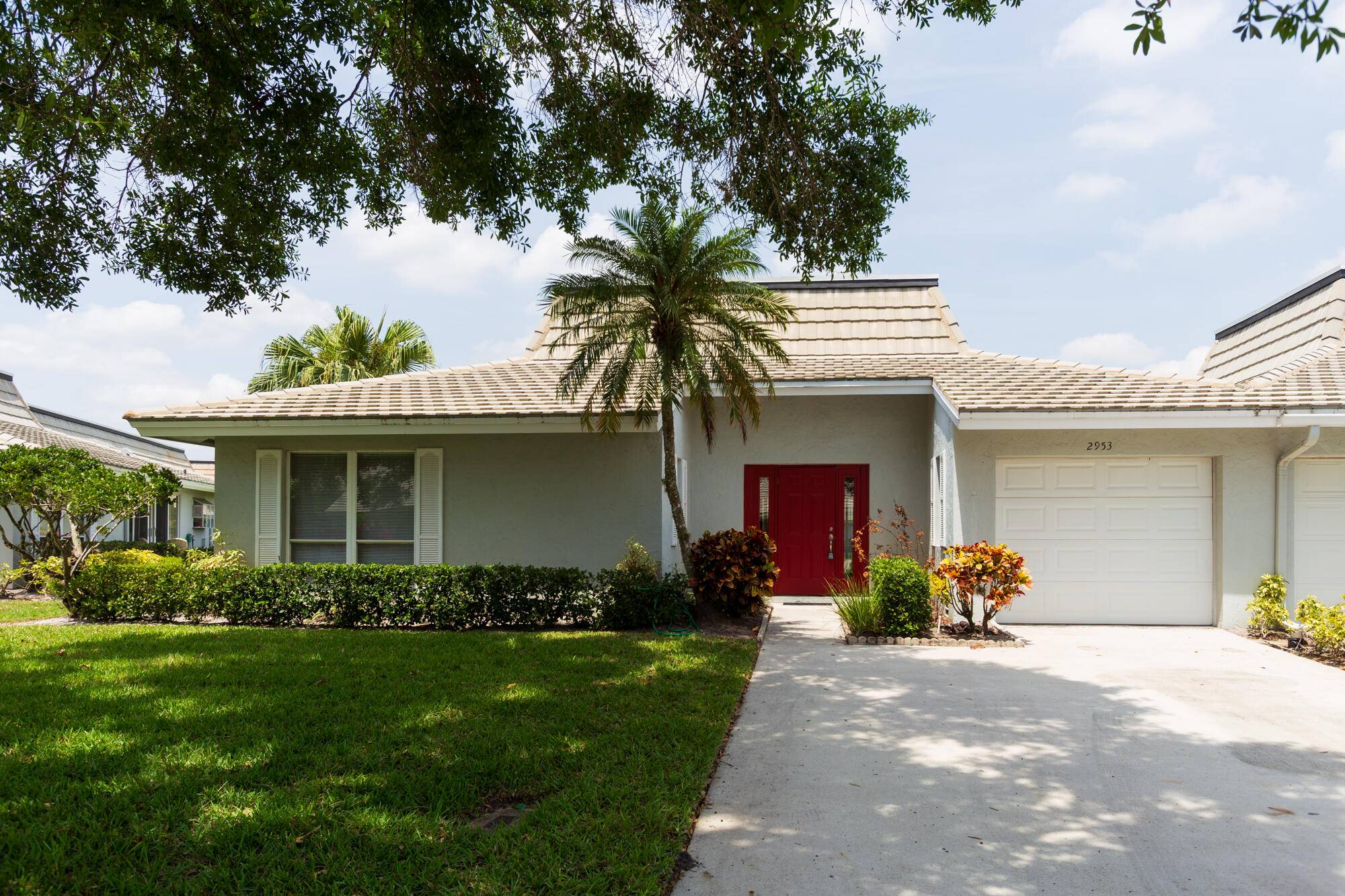 Discover the rare opportunity to own this desirable end unit villa in Eagle Lake, part of the sought after Martin Downs community in Palm City.