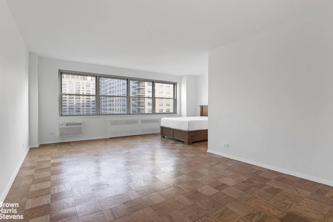 Welcome to Apartment 22F a bright, oversized alcove studio perched on the 22nd floor of 165 West End Avenue within the coveted Lincoln Towers complex.