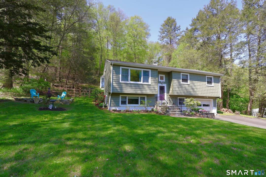 Move right into this beautifully updated 3 bedroom, 2 full bath Raised Ranch set on a private 2.